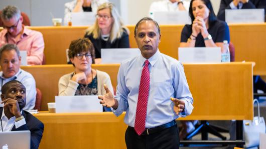 Professor Krishna Palepu teaching to a diverse group of executives